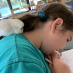 Otters Student with Dodo the Class Budgie