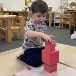 Caboolture Montessori School Tadpole Toddler exploring the Pink Tower